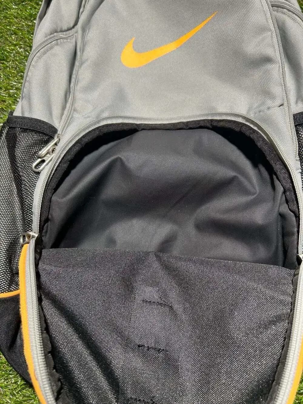 Nike Gray and Black Sport Backpack with Orange Accents